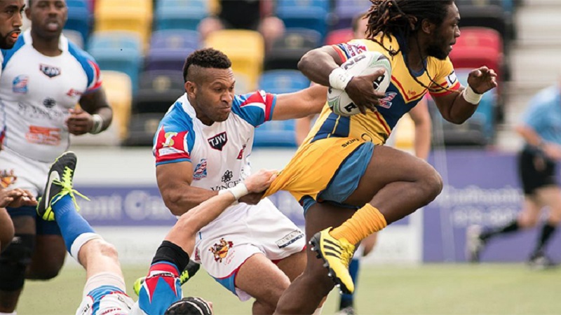 Rhinos Open Title Defense with Solid Win